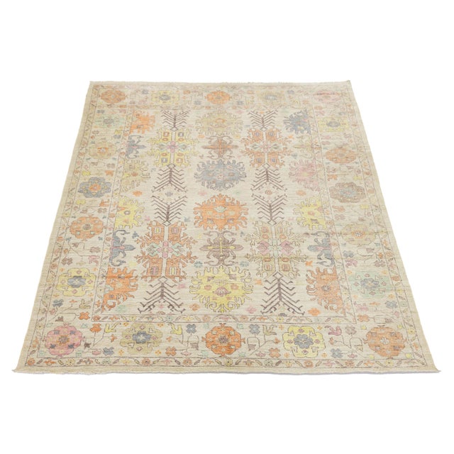 This stunning Modern Oushak Style rug combines traditional Turkish motifs with a contemporary color palette. Hand-knotted...