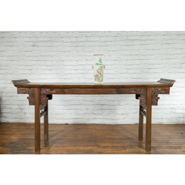 A Chinese Qing Dynasty hand-painted altar vase from the 19th century, with birds, flowers and tree décor, and gilt trim....