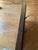 Antique wooden mirror with lovely carved details. The carved bow on the top extends the total height to 19 1/2 inches, the...