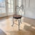 An antique American child’s chair dating to circa 1900–1915, constructed from delicately formed iron and steel wire with...