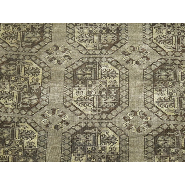 A rare room size Afghan Ersari rug in brown and gray. Usually found in 6 x 9 up to 8 x 10 size formats this one is a full...