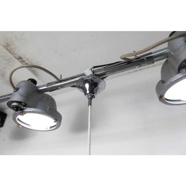 Floral suspension in chrome metal and gray smoked glass from the 1970s. It is in perfect condition, no chips on the glass...