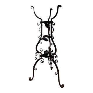 Continental Wrought Iron Tripod Plant Stand With Scrollwork and Foliage Circa 1880 For Sale