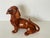 Vintage glazed ceramic figurine dachshund , signed by artist.