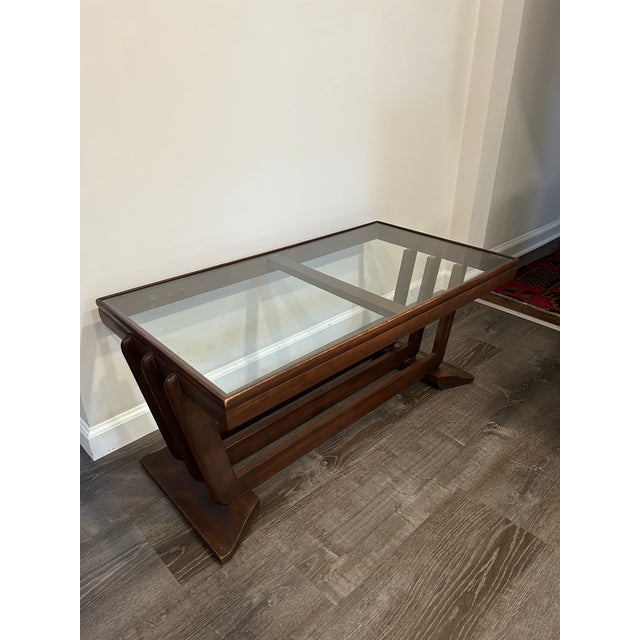 Streamline Moderne Art Deco cocktail/coffee table in solid walnut. A classic American Art deco design. Reminiscent of the...