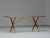 This iconic dining table, often referred to as the “sawbuck table” (model at-303), was designed by hans j. Wegner and...
