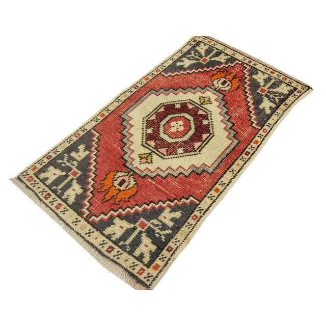 Vintage Handknotted decorative mini rug from Konya region of Turkey. Approximately 45-55 years old. In very good condition.