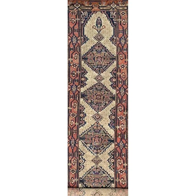 ACTUAL SIZE: 3’1″ x 14’2″ PRIMARY COLOR: Ivory / Blue AGE: Antique ORIGIN: Turkey MATERIALS: Wool FOUNDATION: Cotton...