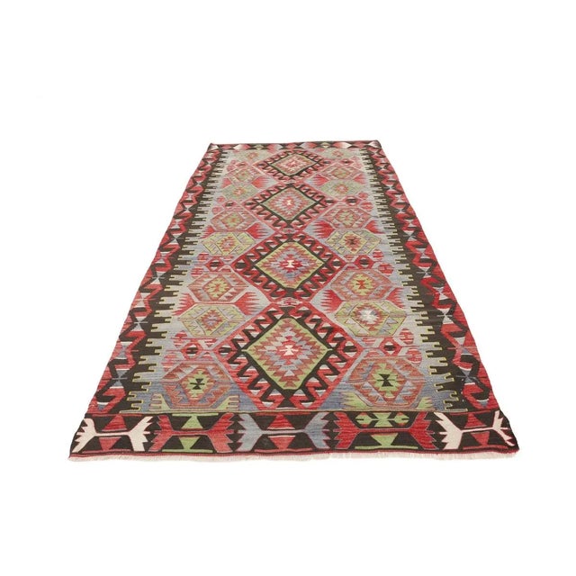 Vintage handwoven decorative kilim rug from Denizli region of Turkey. Approximately 50-60 years old. In very good condition.