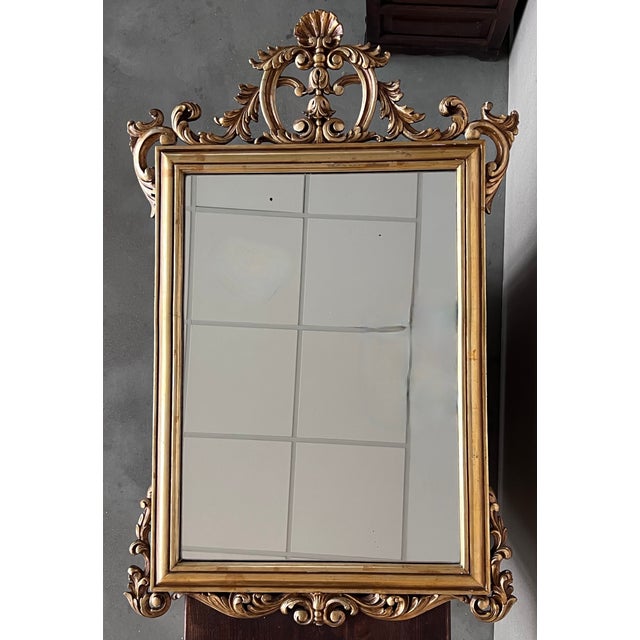 20th French Empire period carved gilt wood rectangular mirror An exceptional hand carved and gilded Italian mirror. Highly...