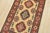 A tribal Caucasian Kazak rug is hand-knotted with an all-wool pile on a cotton foundation. This oriental rug features...
