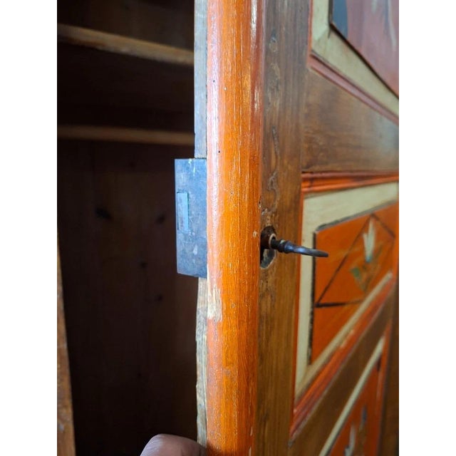 Hand-painted wardrobe / folk art, floral decoration, 19th century. Charming two-door wardrobe made of solid wood, richly...