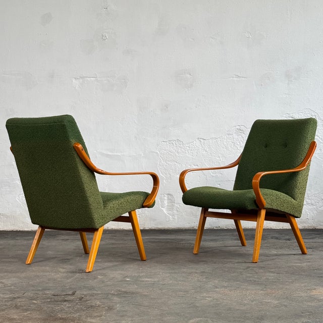 This set of two armchairs is designed by the czech designer jaroslav smidek, a notable figure in czechoslovak mid-century...