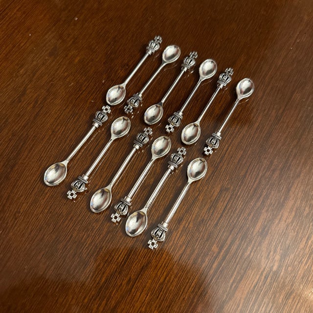 Perfect for your holiday table, a set of 12 silver plated mini salt spoons for your personal salt cellars with decorative...