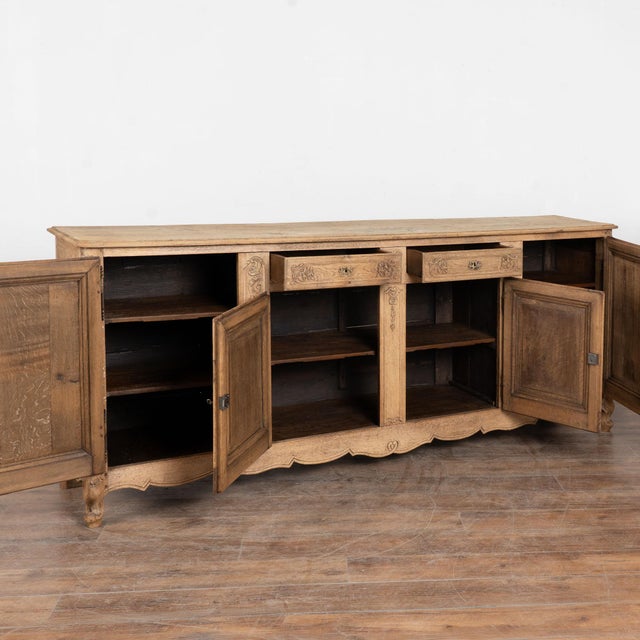 This French sideboard is crafted in oak and offers a traditional French country look in an impressive scale measuring just...