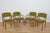 A set of four danish model j62 armchairs designed by poul m. Volther for the danish design cooperative fdb møbler in the...