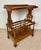 Elegant Victorian walnut Canterbury featuring a removable tray top, open slatted storage compartment, and a lower drawer....