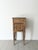 An early 20th Century continental side table with a marble top and elegant tapered legs upon arrow feet. This refined...