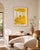A vibrant 20x30 inch, archival pigment photographic print featuring a figure surrounded by a room filled with yellow...
