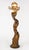 Artmax sculptural floor lamp featuring an elongated female figure with an illuminated hat-style shade. The hand-painted...