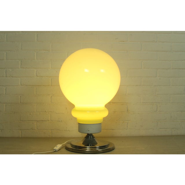Bring an authentic piece of Italian design history into your interior with this monumental Space Age table lamp. Sourced...