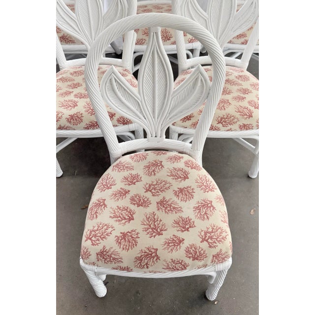 Imagine transforming your dining space with this stunning set of six vintage coastal rattan dining chairs, beautifully...