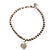 A charming vintage Tiffany & Co. bead bracelet crafted in sterling silver, featuring signature charm: a classic “Please...