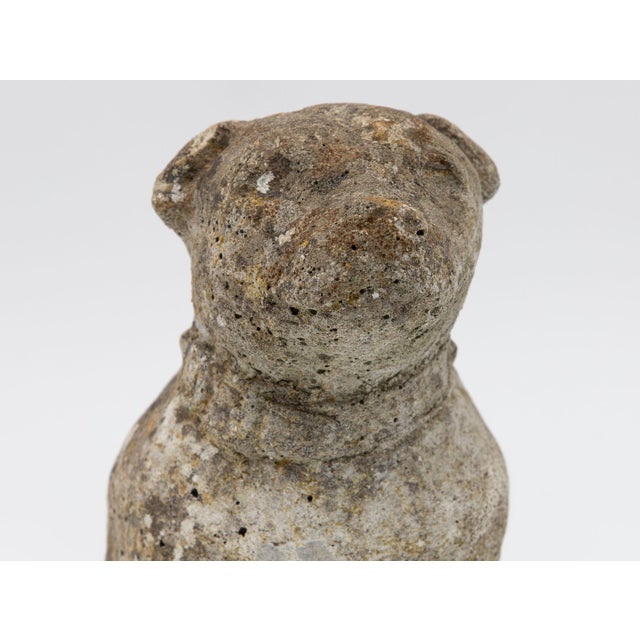 Strong and full of personality, this English 1970s era composite stone bulldog figure sits with a proud, slightly lifted...