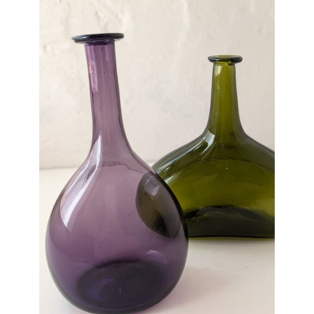 Pair of Vintage European Handblown Glass Vases – Lilac & Green Add timeless elegance to your home with this exquisite pair...