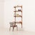 This Danish mid-century walnut shelving unit comes from the 1960s and was most likely produced by Cadovius, as indicated...
