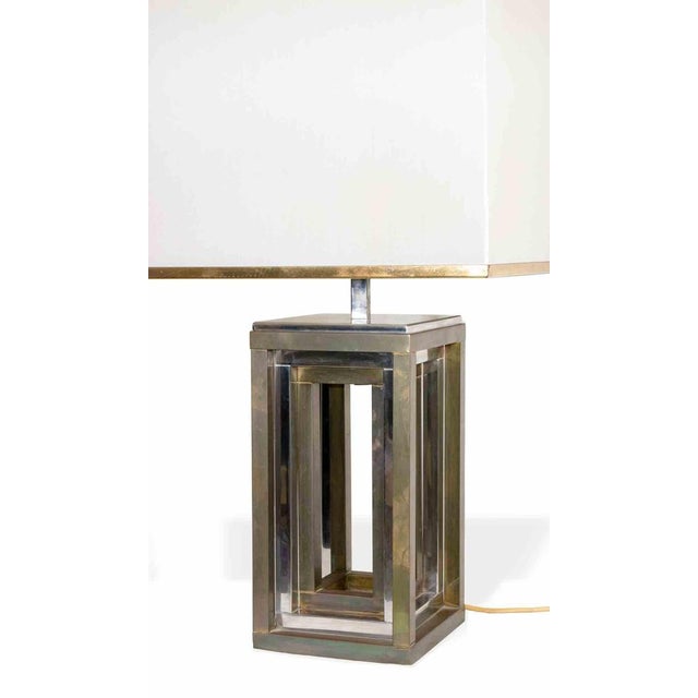 Table Lamp is a mid-century design item realized in 1970s. Metal lamp. This piece has an attribution mark, I am sure that...