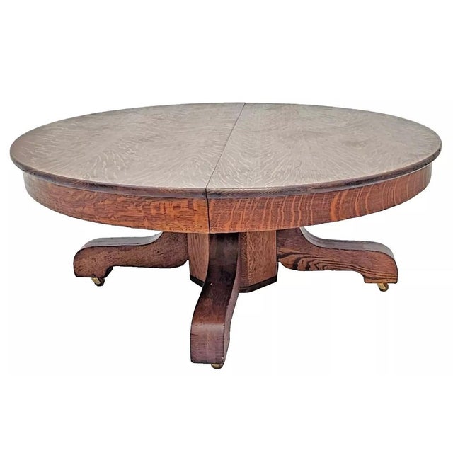 Add timeless elegance to your home with this Antique Mission-Style Round Coffee Table, crafted from premium solid quarter...