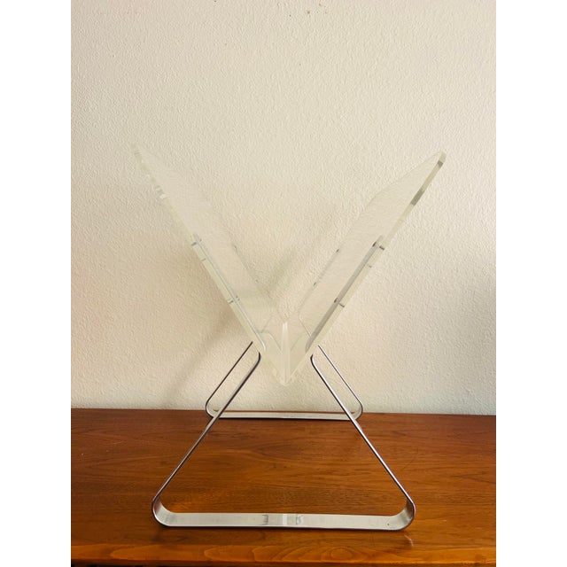 Vintage-Inspired 1970s Milo Baughman Style Chrome & Lucite Magazine Holder / Rack Bring sleek mid-century modern elegance...