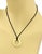 The Tiffany & Co. Peretti Sevillana 18k Yellow Gold & Black Cord Pendant Necklace is a luxurious and elegant piece of...