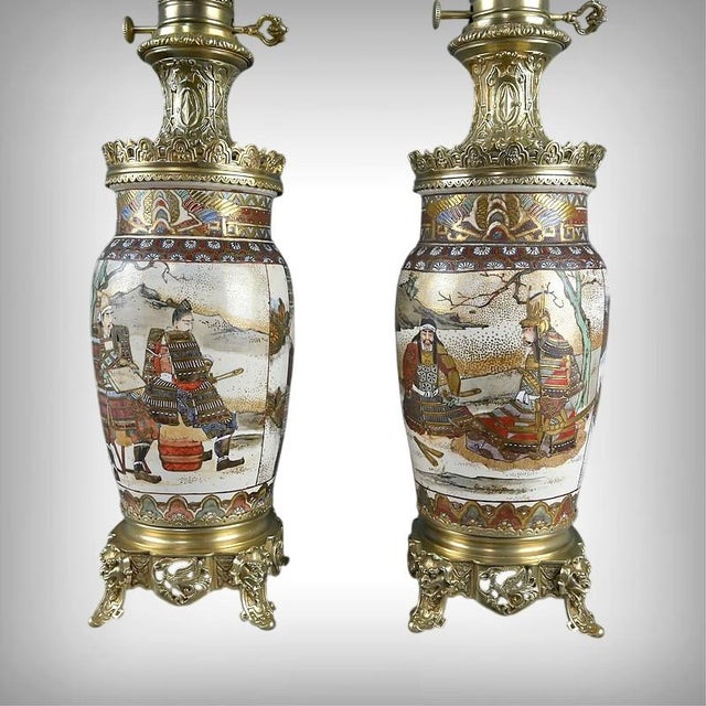 This remarkable pair of Japanese porcelain lamps is distinguished by the extraordinary finesse of its hand-painted...