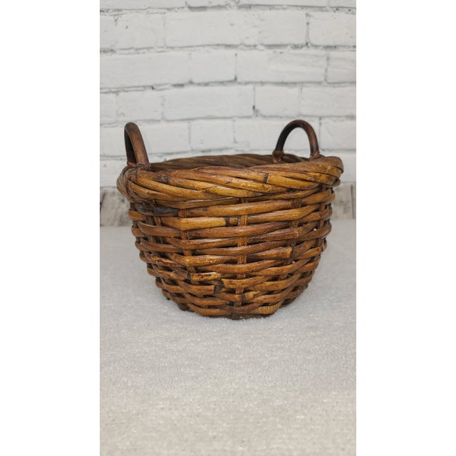 Vintage double handle hand-woven rattan basket. woven using thick split cane. Sturdy and well built. it's beautiful...