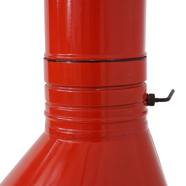 Steel-bodied, enameled in “don’t-look-away” red, Pre-Way’s freestanding design was part of a mid-century shift toward...