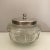 Cut crystal jam pot / preserves jar with a silver plated lid with lineair engravings and a spoon slot (no spoon included)....