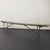 This long rustic industrial nautical campaign bench was made for use on U.S. Navy ships in the 1940s. The bench features...