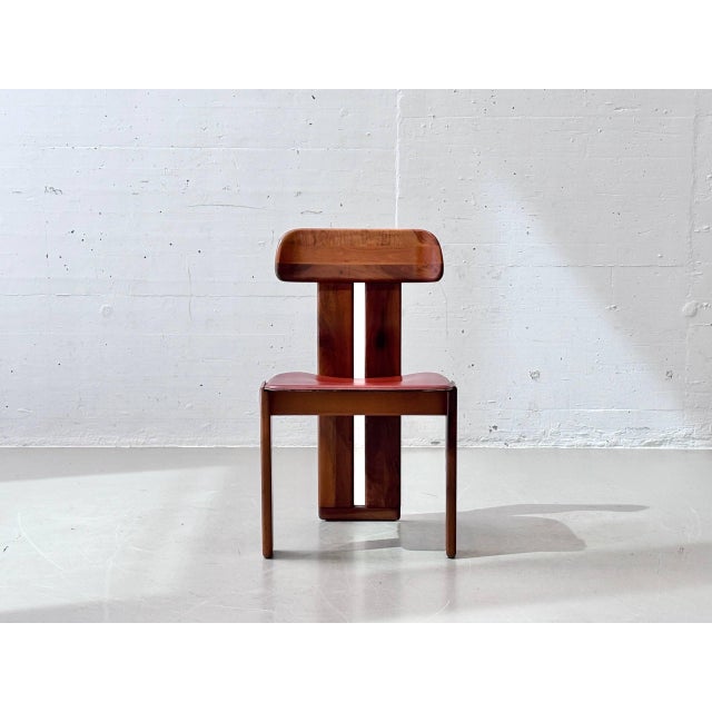 A sculptural set of four "sapporo" dining chairs, designed by mario marenco for mobilgirgi in the 1970s. The striking...
