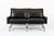 This incredible vintage postmodern black leather loveseat couch in the style of Poul Kjaerholm is circa 1980. The unique...