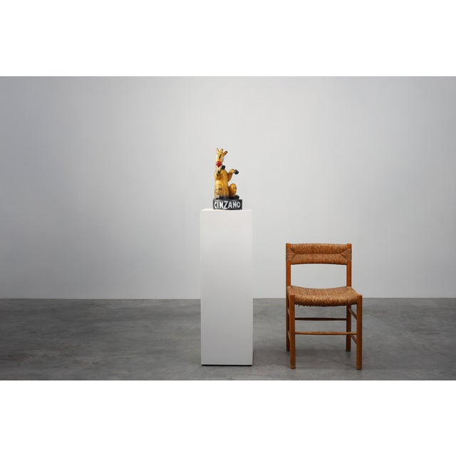 A rare and charismatic example of early 20th‑century commercial art, this signed plaster advertising statue for Cinzano...