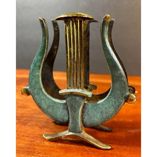 Beautiful vintage bronze letter holder in the form of a harp or lyre. Made in Israel, marked on the inside. Nice green...