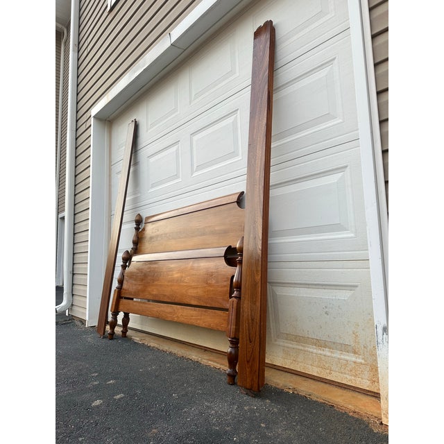 Timeless craftsmanship meets heirloom charm in this vintage Colonial Revival poster bed, beautifully constructed in solid...