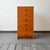 Product: tall chest of drawers style: 1980s/1990s material: teak veneer features: six drawers condition: good condition...