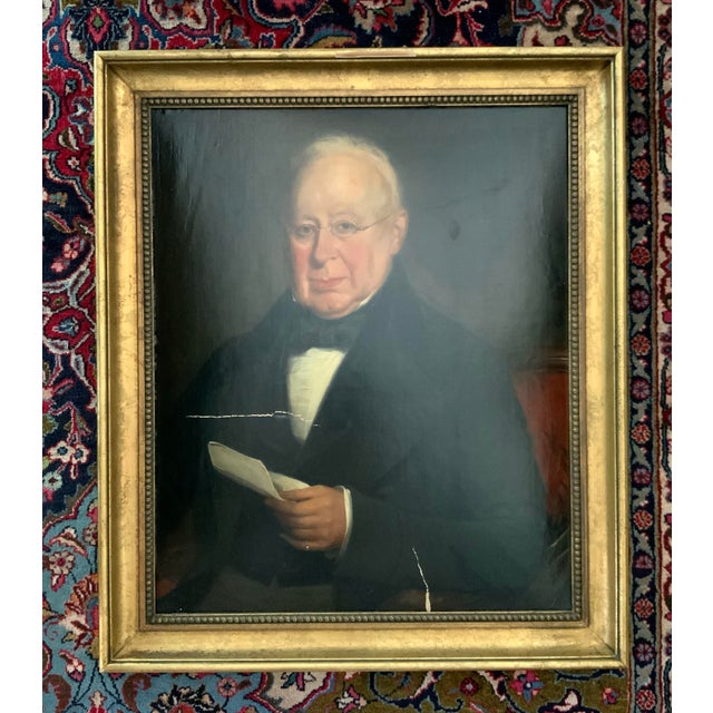 A dignified mid‑19th‑century oil portrait of a gentleman, executed in the traditional academic style and later marouflaged...