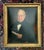 A dignified mid‑19th‑century oil portrait of a gentleman, executed in the traditional academic style and later marouflaged...