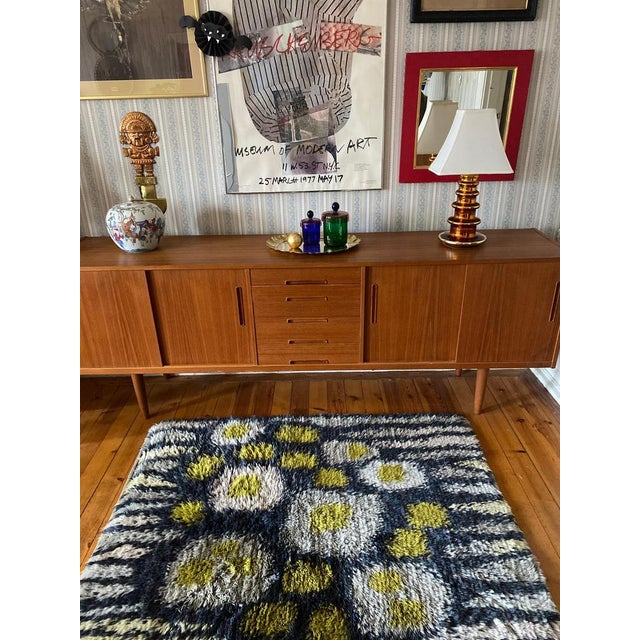 This exquisite mid-century Scandinavian Modern rya rug, handmade in Sweden in the 1960s, is a true work of art. Crafted...