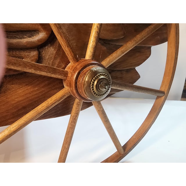 Beautiful and fun wood carved wagon. This is so unique and fun, change her up for the season with flowers and holiday...