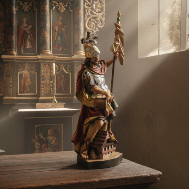 This hand-carved wooden devotional figure represents Saint Florian, the traditional patron saint of firefighters and...